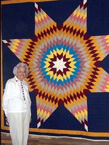 Ruby with one of her quilts.